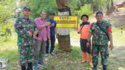 Koramil Kasembon Pasang Banner Peringatan Dini Antisipasi Longsor dan Pohon Tumbang
